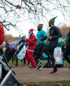 Santa and elves warming up before the race!